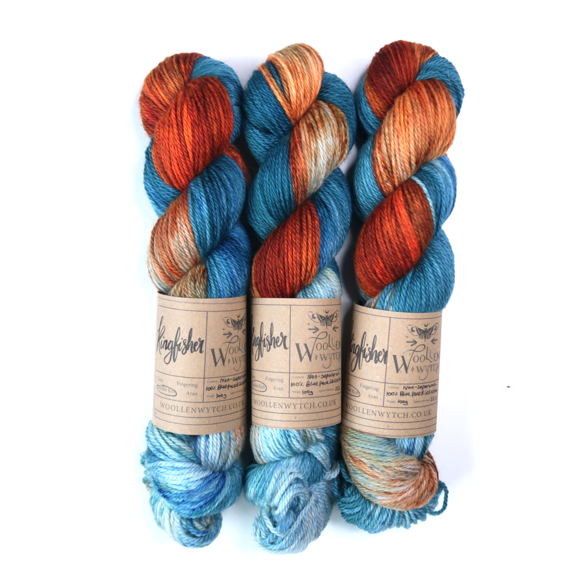 Kingfisher inspired hand dyed yarn using oranges and blue by Woollen Wytch