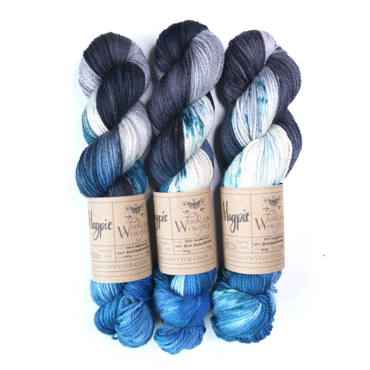 Magpie hand dyed yarn in blue, silver and black on bluefaced Leicester British yarn by Woollen Wytch