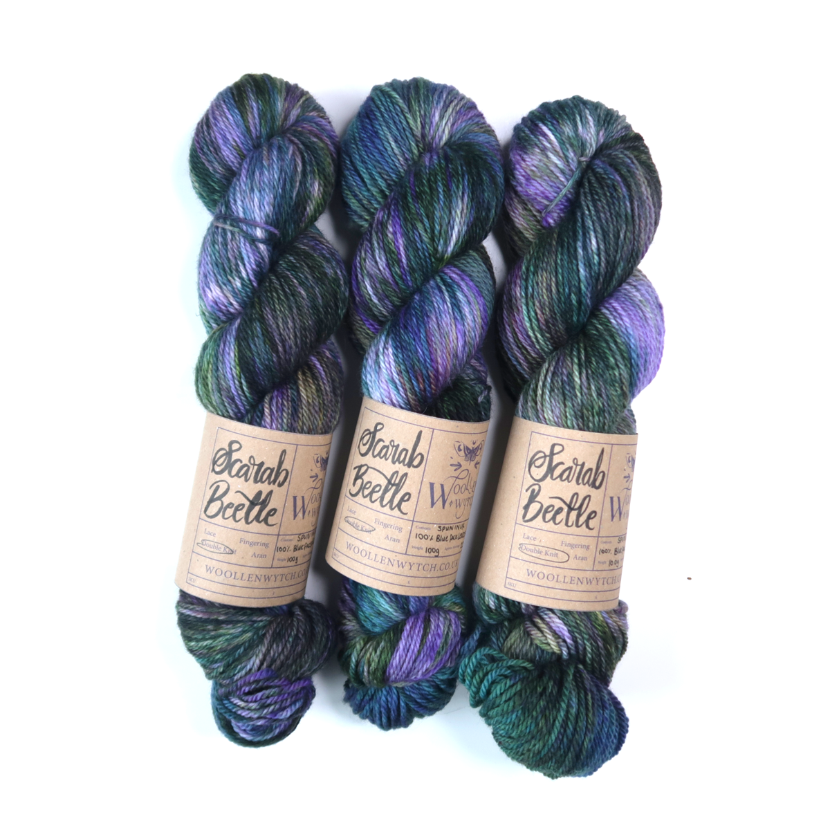 Purple and green scarab bettle hand dyed bfl yarn doulbe knit by woollen wytch